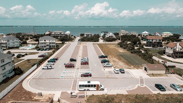 drone-shuttle-bus-parked-beach-town.jpg