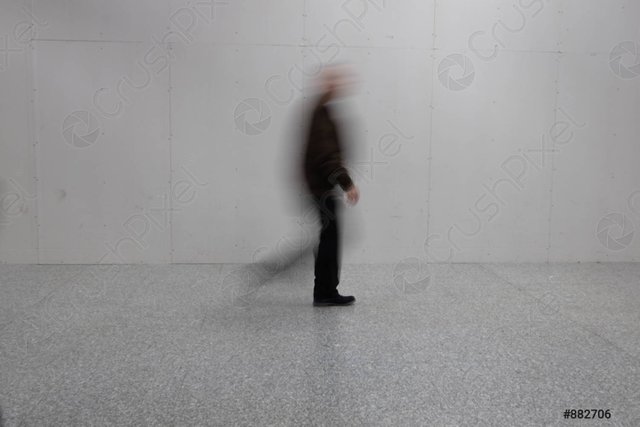 blurred-man-walking-882706.jpg