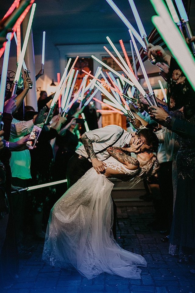 star-wars-wedding-newlyweds-exit-with-lightsabers-haleemamanzurphotography.jpg