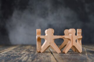 business-success-teamwork-concept-with-wooden-figures-people-side-view_176474-9270.jpg