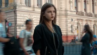 videoblocks-beautiful-lonely-young-girl-stands-alone-in-the-city-among-people_stzomd-cw_thumbnail-small01.jpg