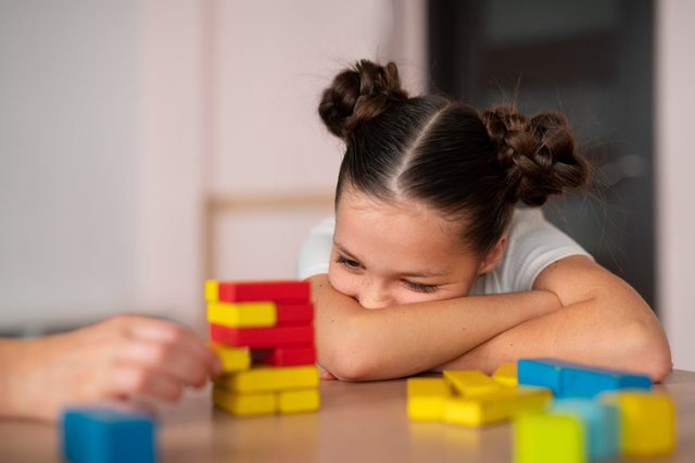 little-girl-doing-speech-therapy-clinic.jpg