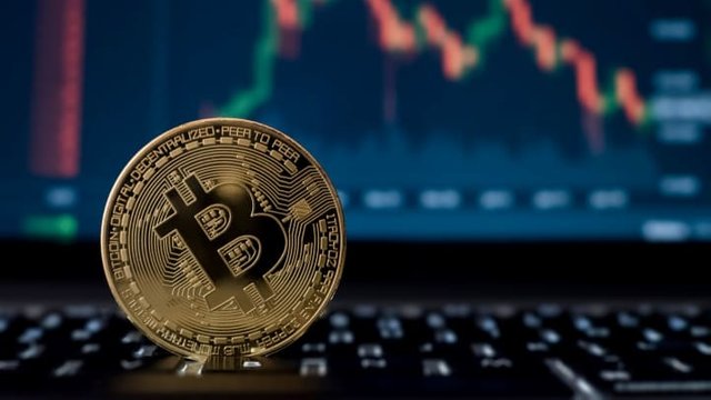 106893887-1623167512779-bitcoin-digital-crypto-currency-with-stock-market-candlesticks-on-computer-screen-rltheis_t20_W7xVwY.jpg