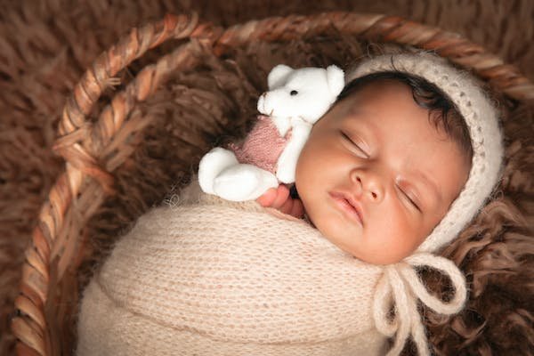 free-photo-of-a-newborn-baby-wrapped-in-a-blanket-lying-in-a-basket.jpeg