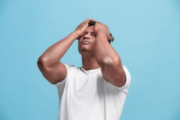 african-american-man-having-headache-isolated-blue-background_155003-9475.jpg