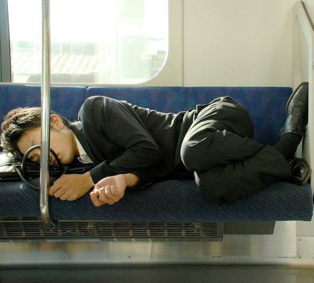 japanese-office-worker-asleep-on-train.jpg