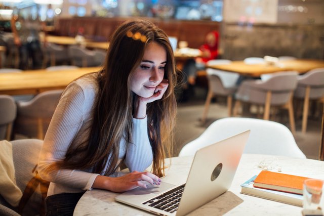 cute-girl-works-laptop-hipster-cafe.jpg