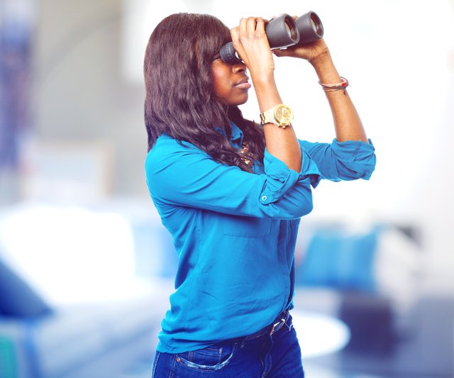 side-view-elegant-young-woman-with-binoculars.jpg