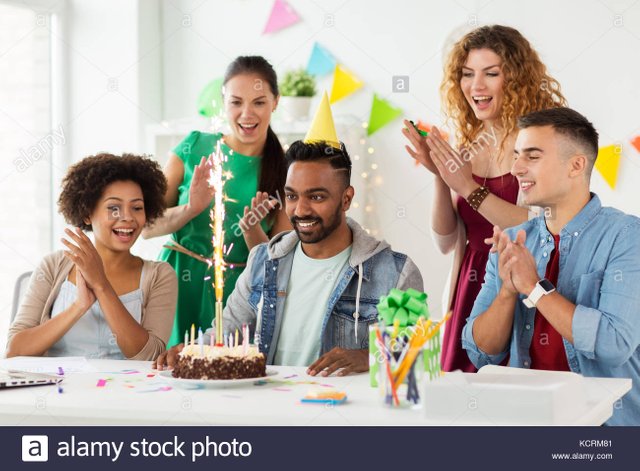team-greeting-colleague-at-office-birthday-party-KCRM81.jpg