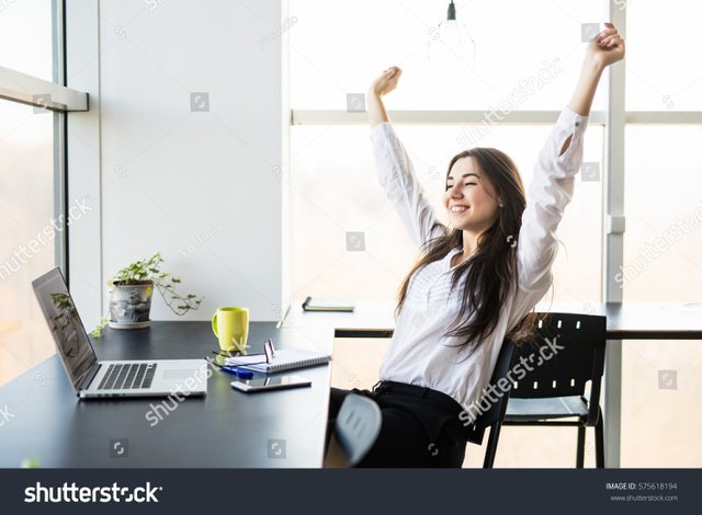 stock-photo-young-lady-relax-at-her-working-place-in-modern-office-575618194.jpg
