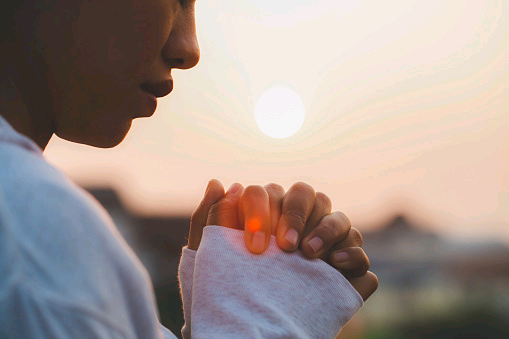 woman-praying-in-the-morning-on-the-sunrise-background-christianity-concept-pray-background.jpg