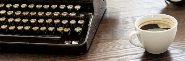 depositphotos_133705078-stock-photo-coffee-and-typewriter-on-desk.jpg