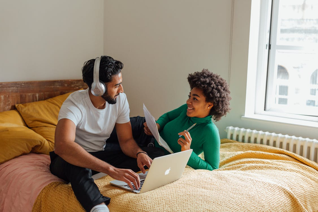 Couple working together on their business