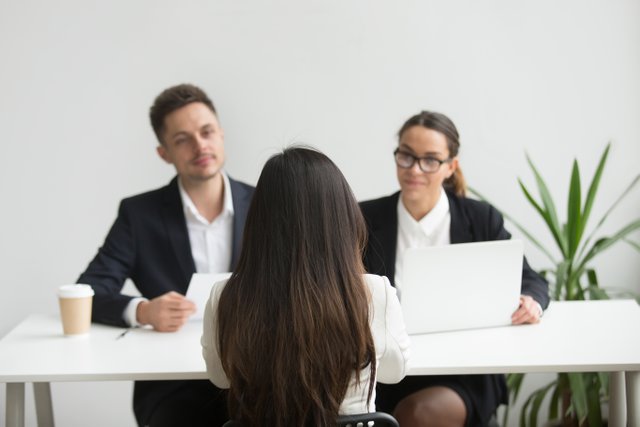 headhunters-interviewing-female-job-candidate.jpg