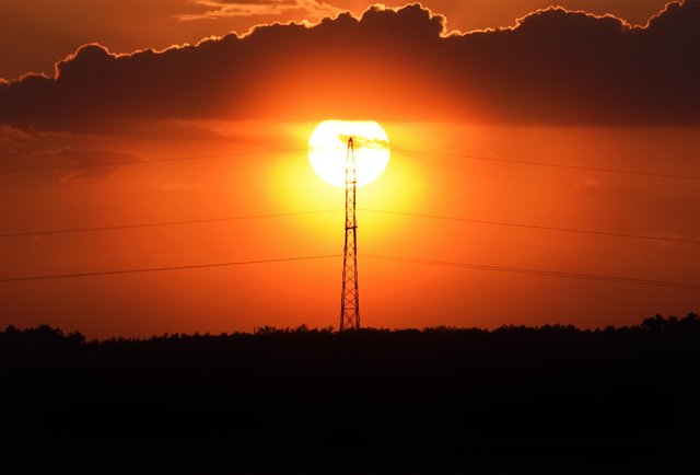 sunset electric poles clouds 2.jpg