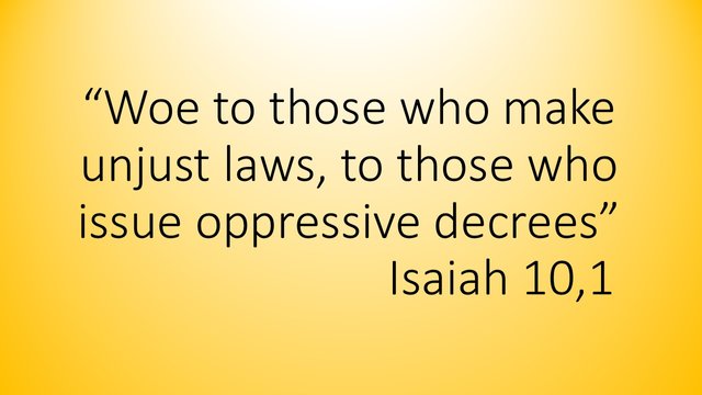 Bible warning. Woe to those who make unjust laws, to those who issue oppressive decrees. Isaiah 10,1.jpg