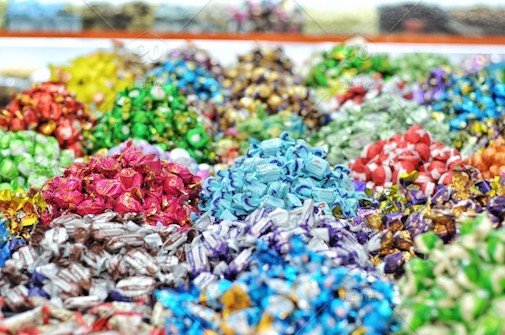 stock-photo-focus-on-foreground-multicolored-colorful-candy-store-wrapped-sweet-collection-f93fb4ba-a0e4-4e86-bfec-85987c77c8c2.jpg