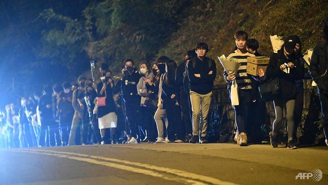 hong-kongers-attend-service-for-student-who-died-during-clashes.jpg