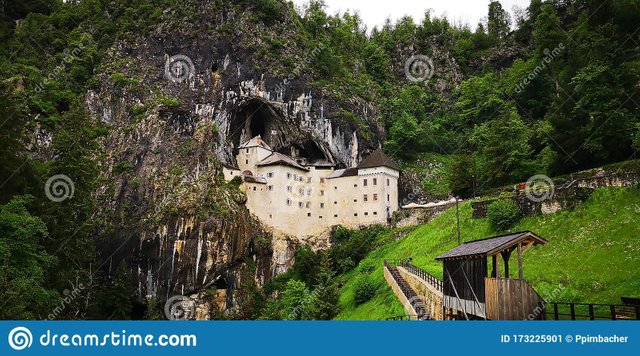 predjama-castle-rock-mountain-cave-predjama-castle-rock-mountain-cave-cof-173225901.jpg