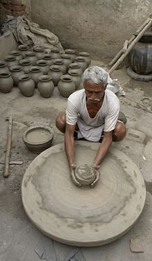 220px-Potter_at_work,_Jaura,_India.jpg