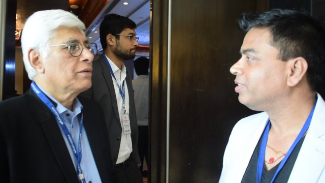 OiX.Global founder Sinha Santos and Nishith Desai Associates Chief at #BlockMumbai Conference.jpg