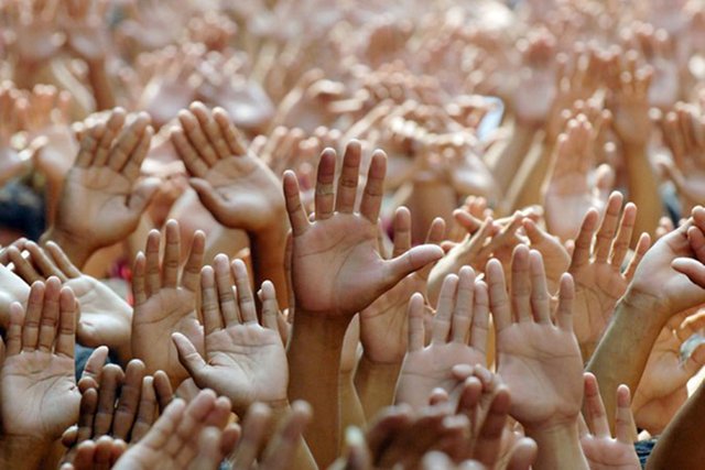 many-raised-hands.jpg