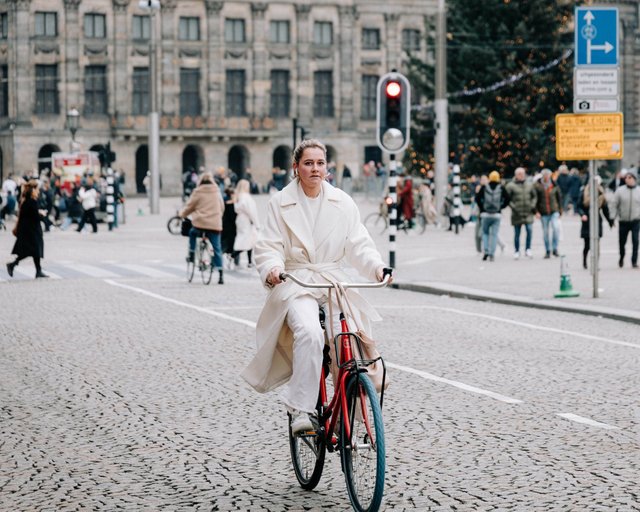 free-photo-of-woman-riding-bicycle-on-city-street.jpeg