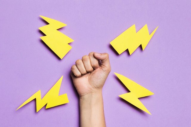 woman-s-hand-showing-power-thunders_23-2148403583.jpg