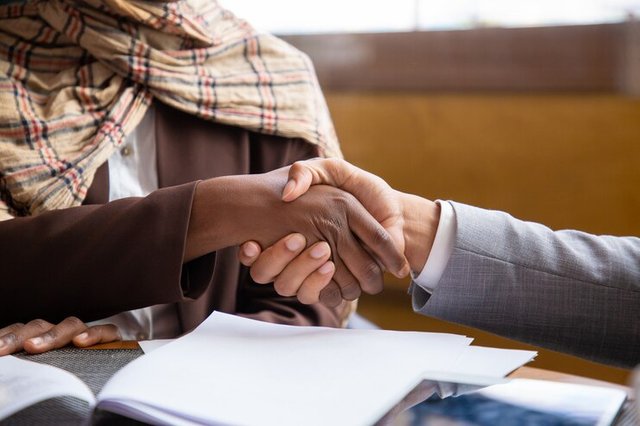 closeup-businesspeople-handshake_74855-1535.jpg