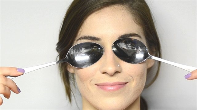 woman with spoons on her eyes.jpg