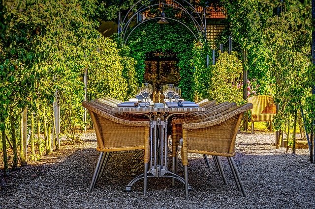 rattan outdoor dining space with outdoor furniture.jpg