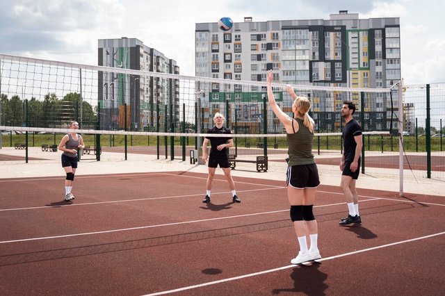 volleyball-players-having-match_23-2149492367.jpg