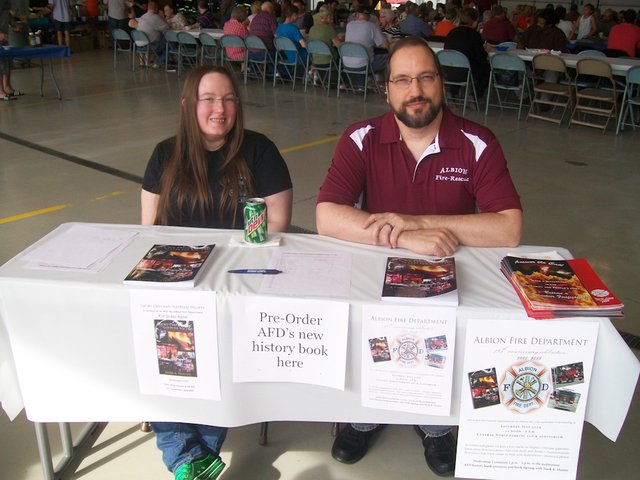 Mark and Emi taking pre orders at AFD fish fry.jpg