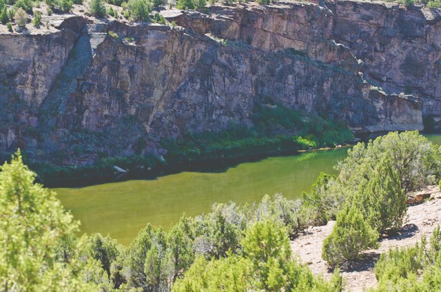 Looking down on the green river and the cliffs.JPG