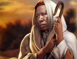 Julius Malema of EFF dressed as Messiah.jpg