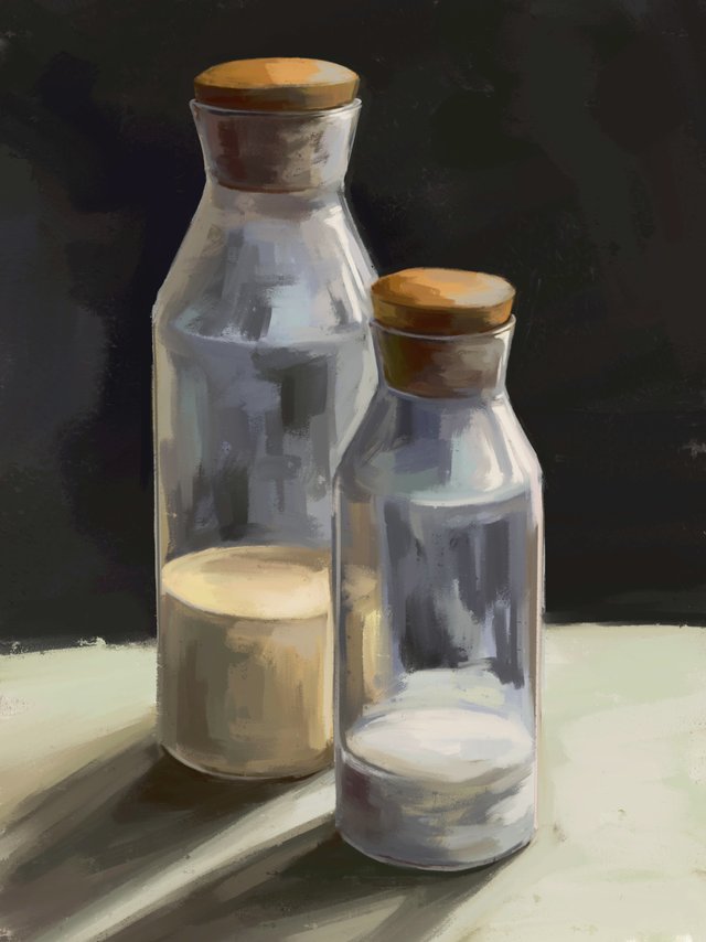 Two glass bottles on dark.jpg