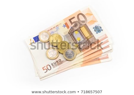 stack-euro-banknotes-coins-isolated-450w-718657507.jpg