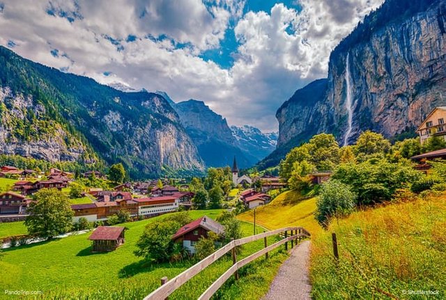 Sunny-view-of-Staubbach-waterfall-in-Lauterbrunnen-village.jpg