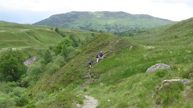 41 Nice one of us going along the lower level path with Beinn an t-Sithean in distance.jpg