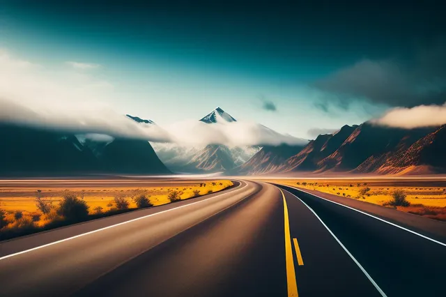 road-leading-mountains-with-blue-sky-clouds_1340-26693.webp