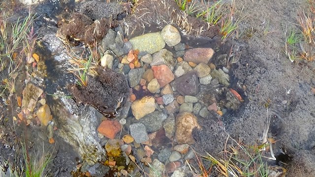 63 Lovely clear pool with lots of colourful rocks.jpg