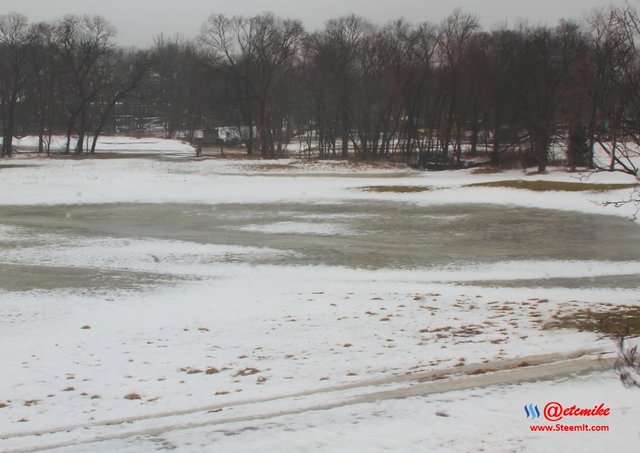 snow melting flood golf course SN0005.JPG