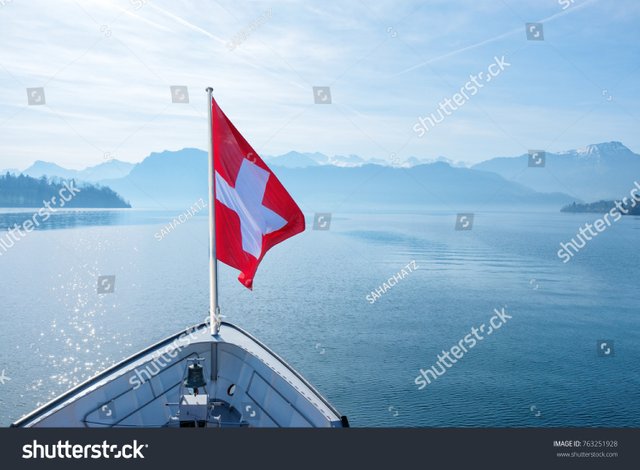 stock-photo-swiss-flag-flying-on-boat-and-rigi-mountain-view-background-763251928.jpg