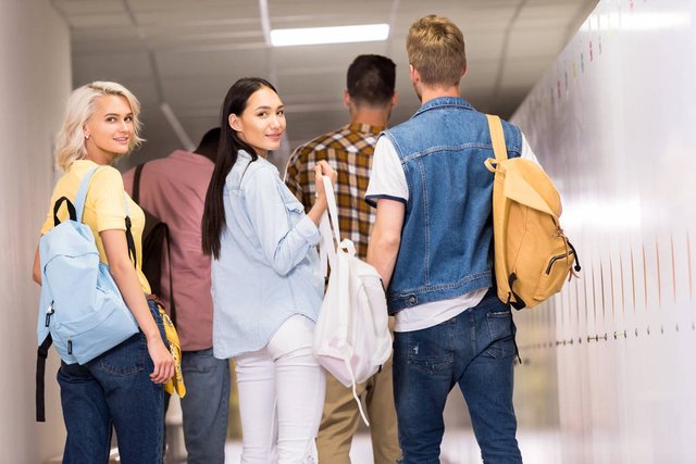 stock-photo-rear-view-young-students-walking.jpg