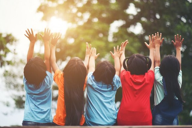 group-kids-friends-arm-around-sitting-together_1150-3907 (1).jpg