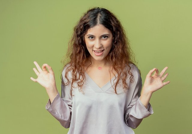 pleased-young-pretty-female-office-worker-showing-okey-gesture-isolated-olive-green-wall_141793-78671.jpg