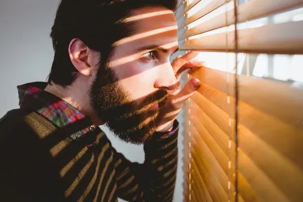 depositphotos_81823062-stock-photo-hipster-businessman-peeking-through-blinds.jpg