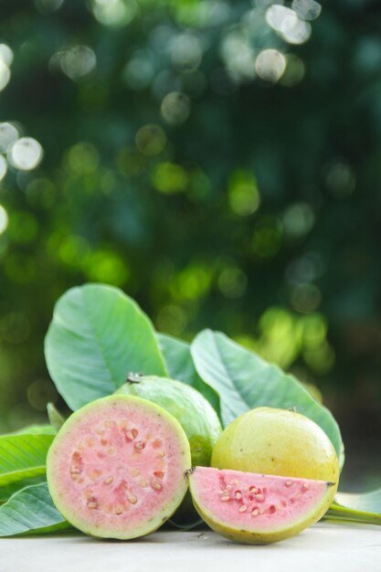 fresh-ripe-guava-sliced-sliced-guava-wooden-table-with-natural-background_1216253-461.jpg