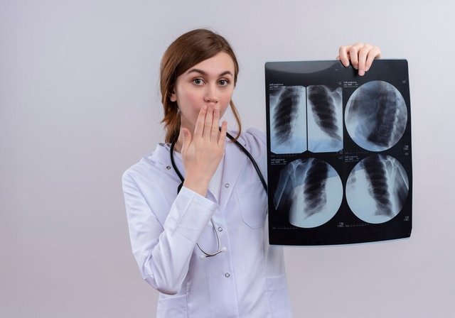 surprised-young-female-doctor-wearing-medical-robe-stethoscope-holding-x-ray-shot-isolated-white-wall-with-copy-space_141793-79092.jpg