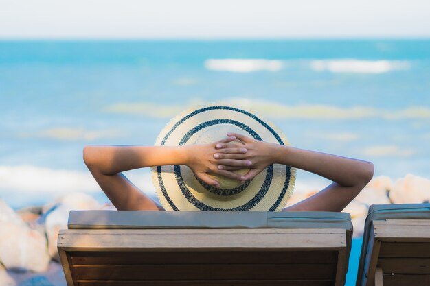 portrait-beautiful-young-asian-woman-happy-smile-relax-around-neary-beach-sea_74190-8155.jpg